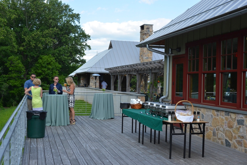 Photo by Jim Moffett
 - A buffet set up on the deck at the Lenfest Center at ChesLen Preserve.
