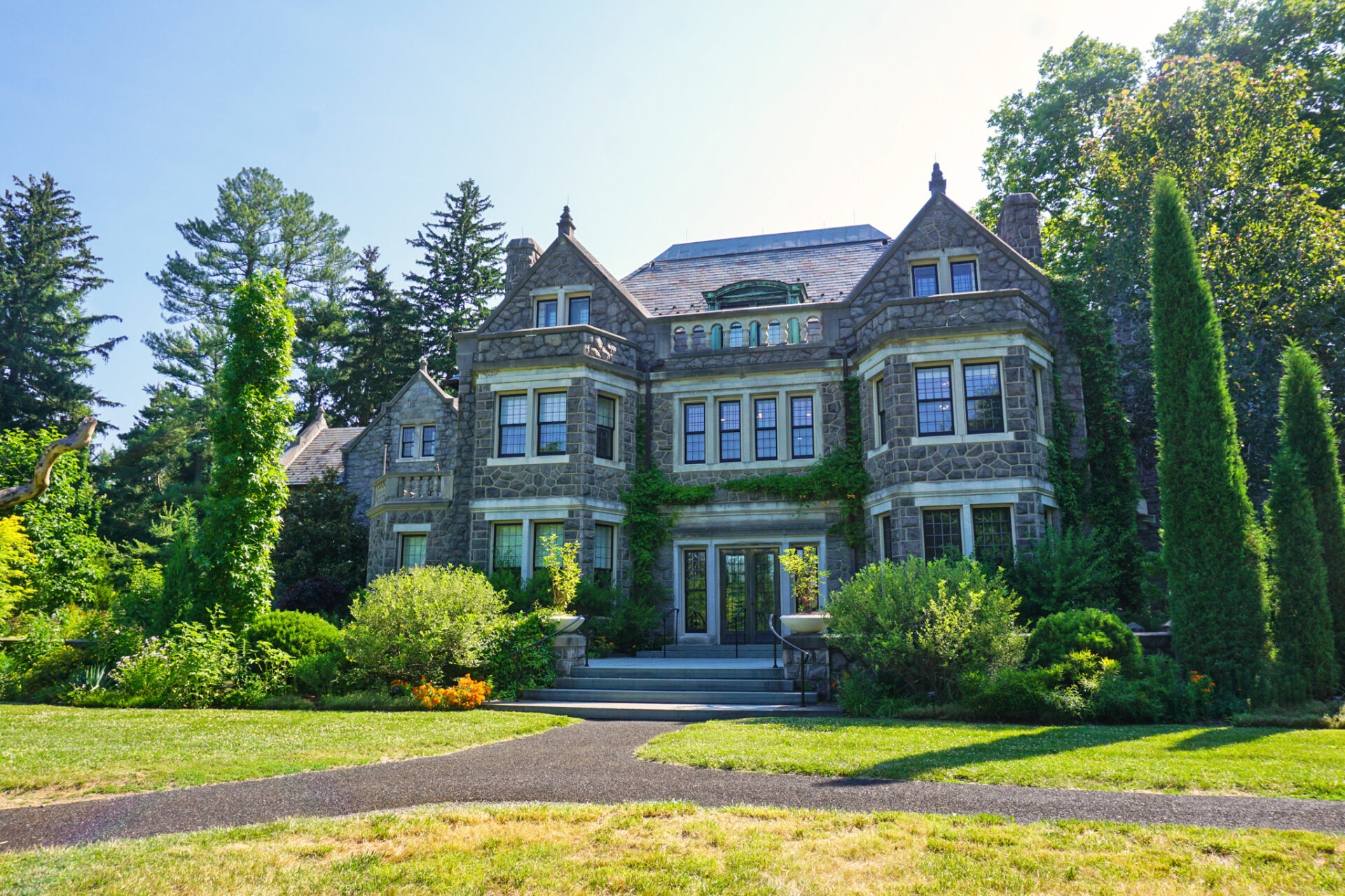 Photo by Samantha Nestory
 - The Main House and terrace in summer at Stoneleigh.
