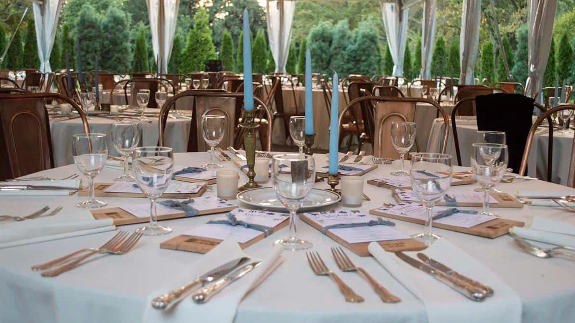 A round table set for dinner at Stoneleigh