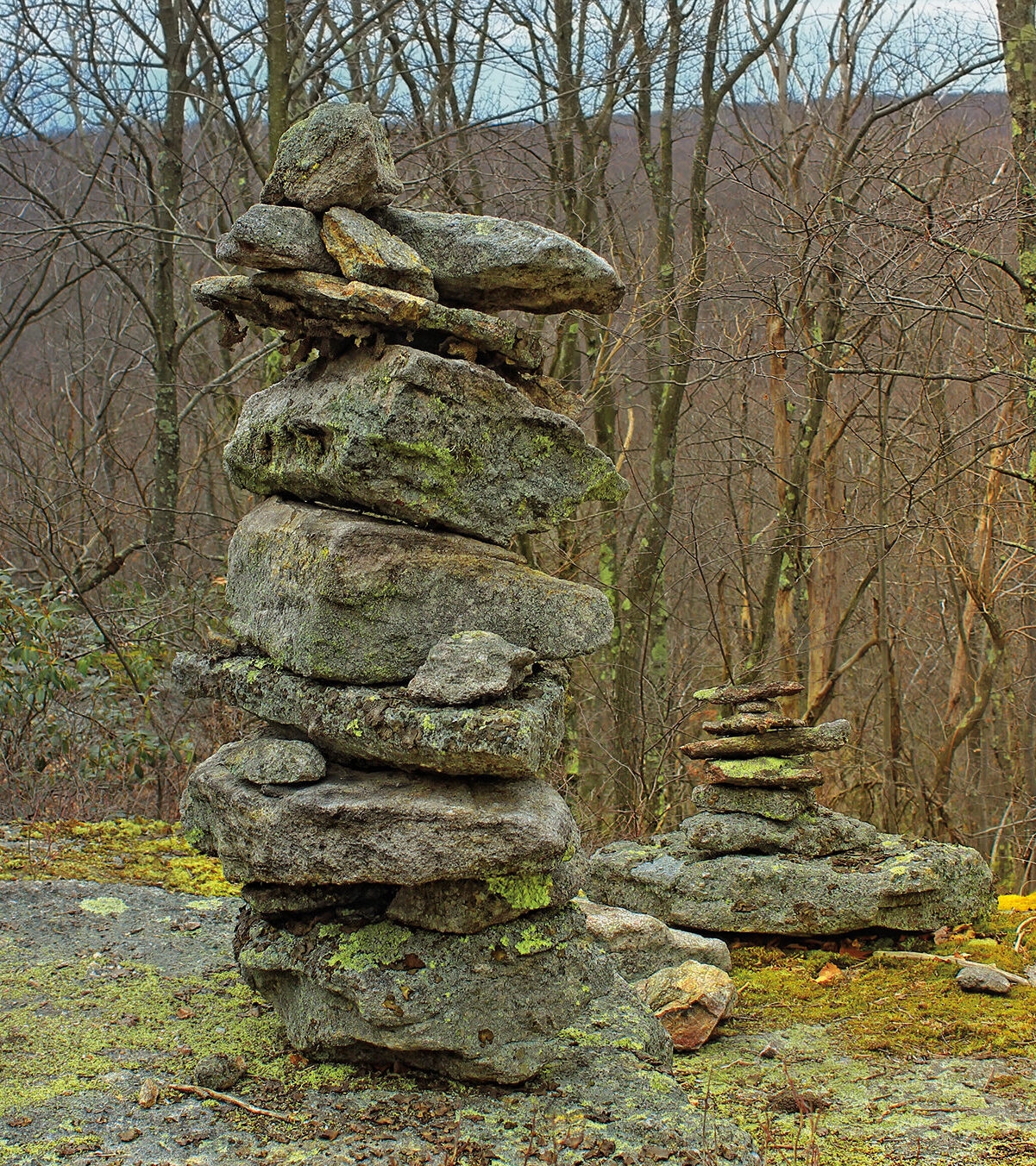 Two rock cairns next to each other