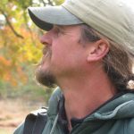 A profile photo of Darin Groff outdoors.