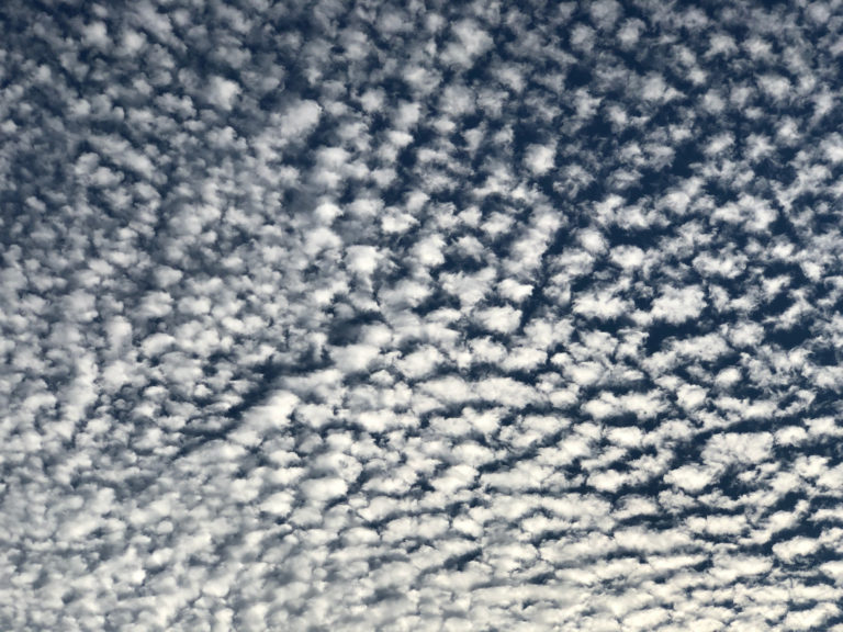 A textured photo of clouds in the sky.