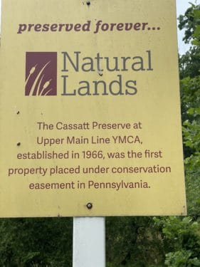 A sign at Cassatt Preserve announcing it as the first conservation easement in PA.