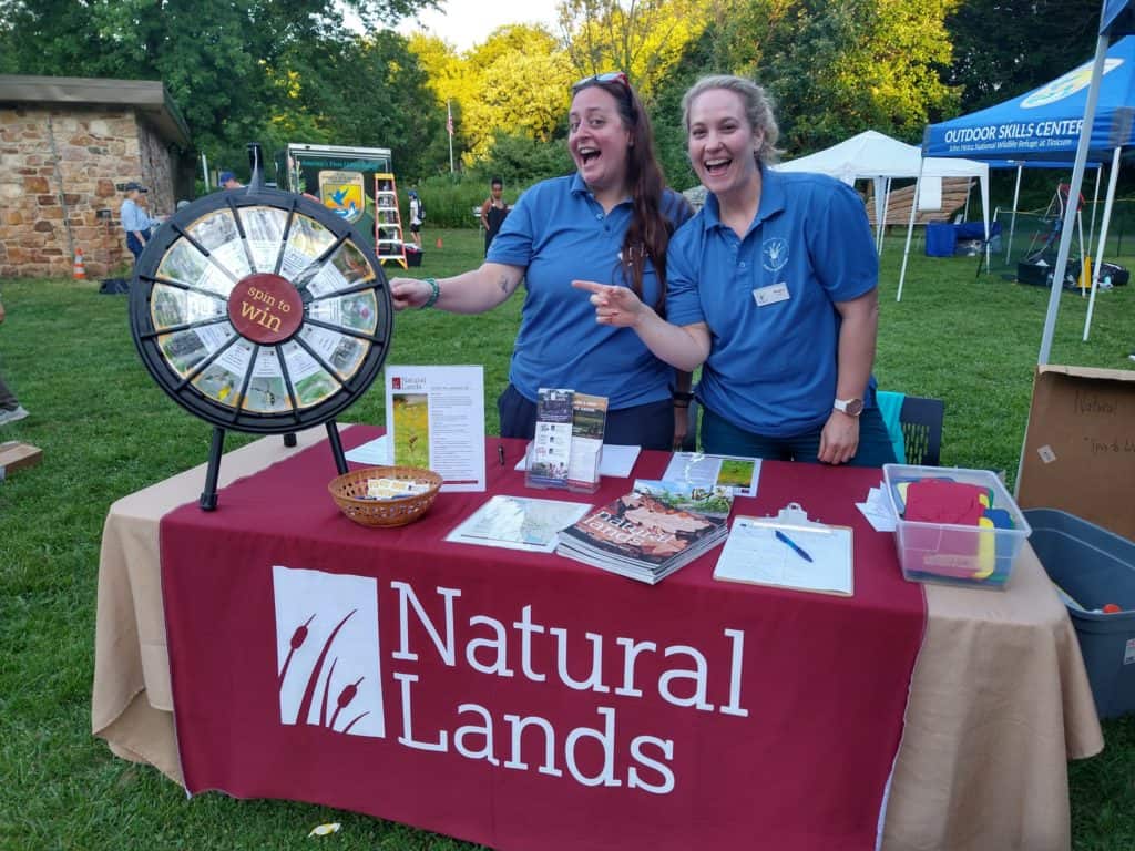 Dedicated Force of Nature volunteers Jen Trumbore (left) and Megan Green ran the outreach table at the event. Photo: Debbie Beer.