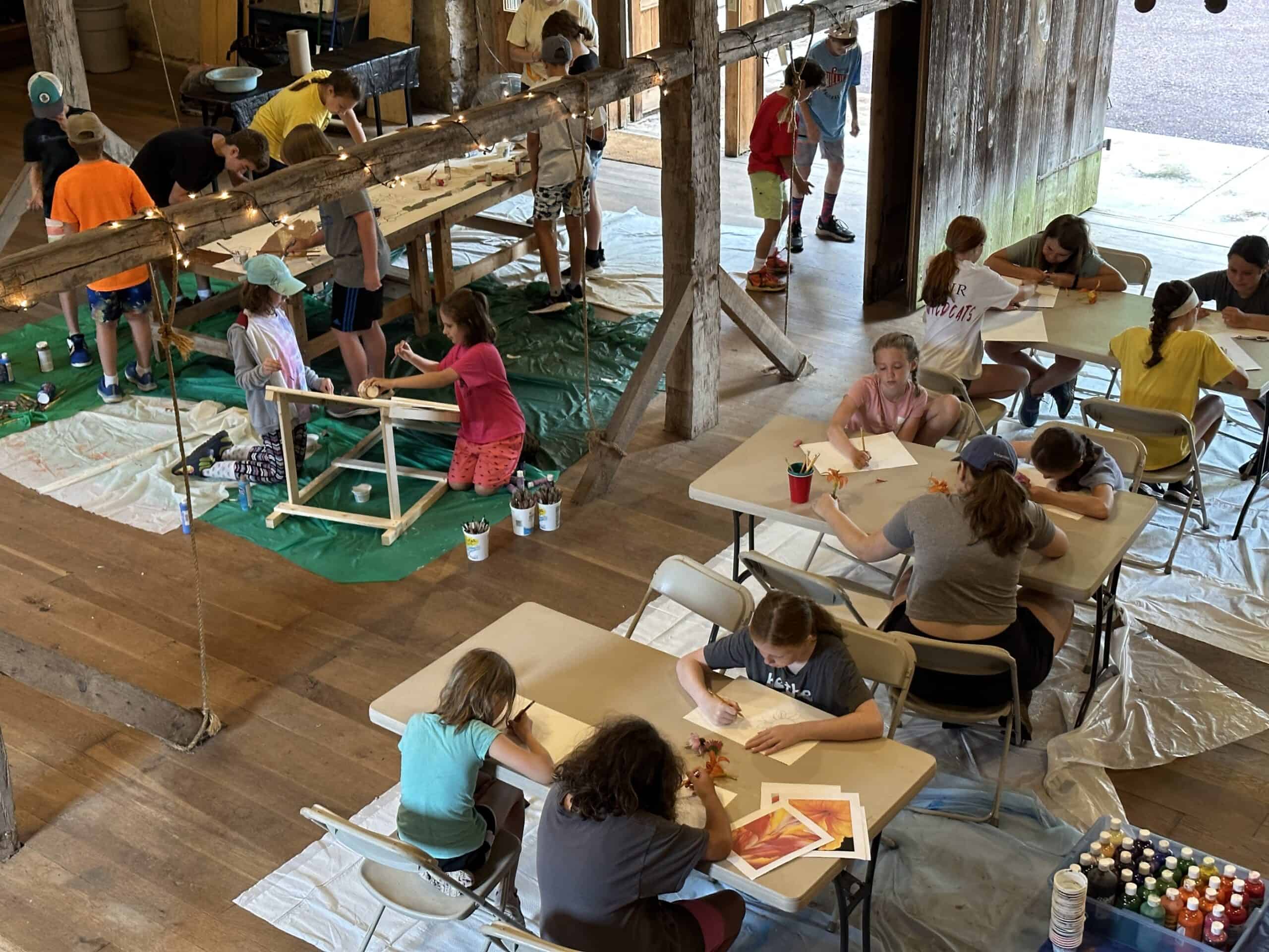 Crow's Nest camp kids doing arts and crafts in the barn