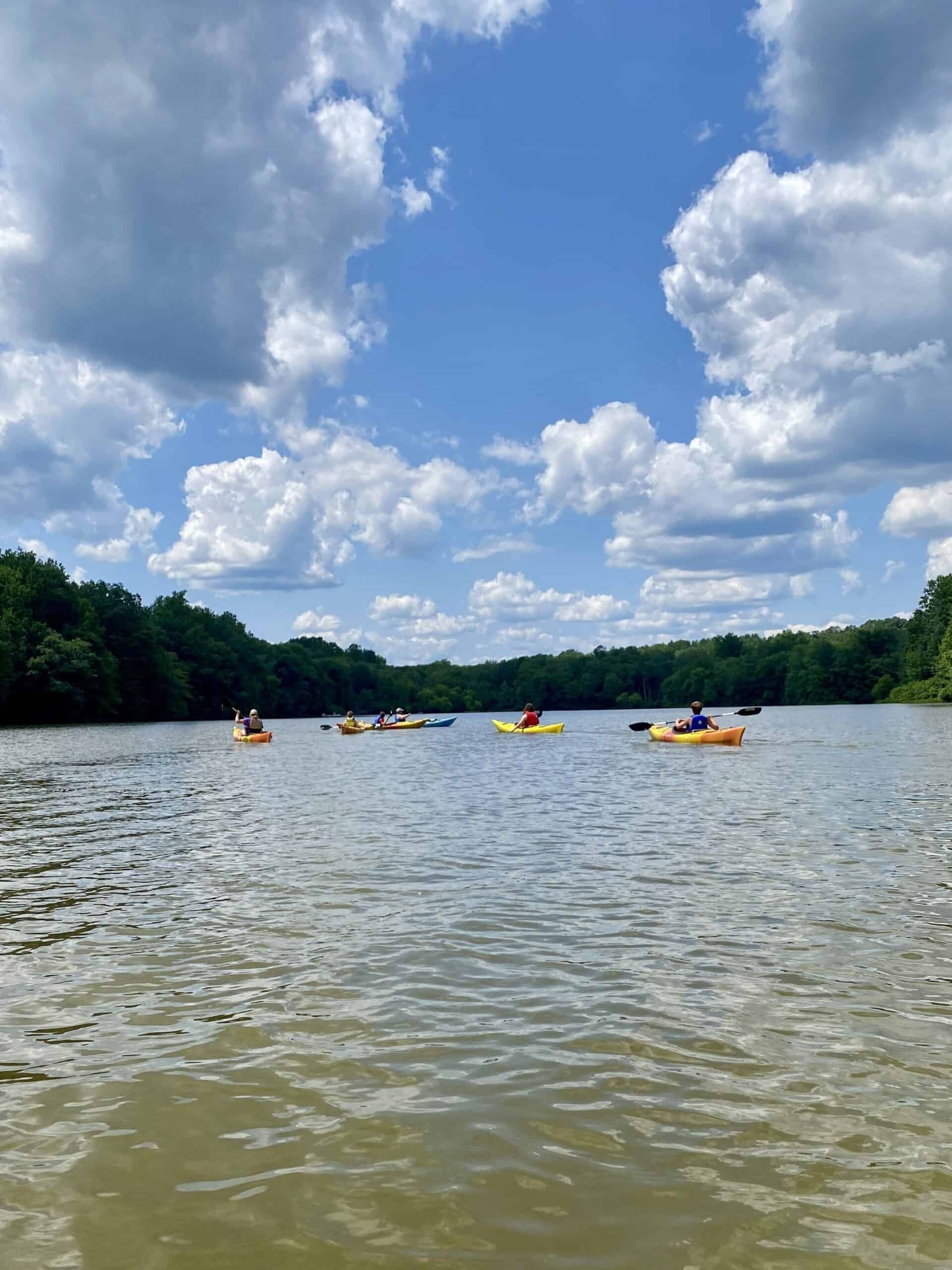Kids from Crow's Nest Camp in kayaks on the Schuylkill River