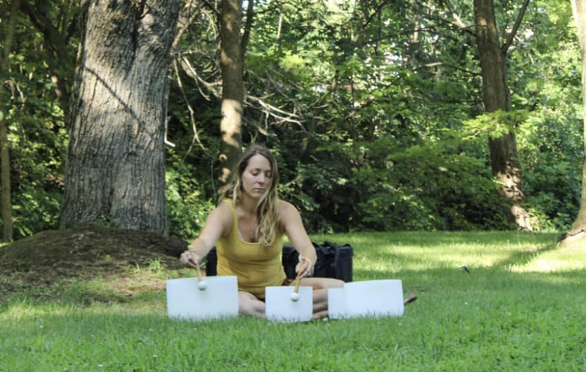 Yoga instructor Kristen Brower performing for a sound meditation