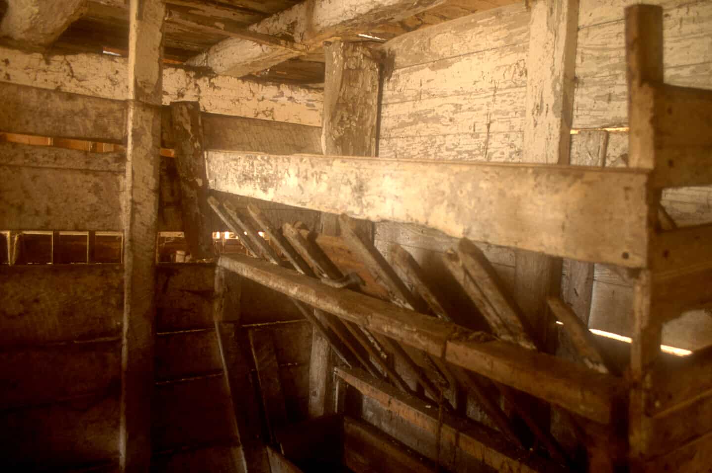 Old hay rack in barn.