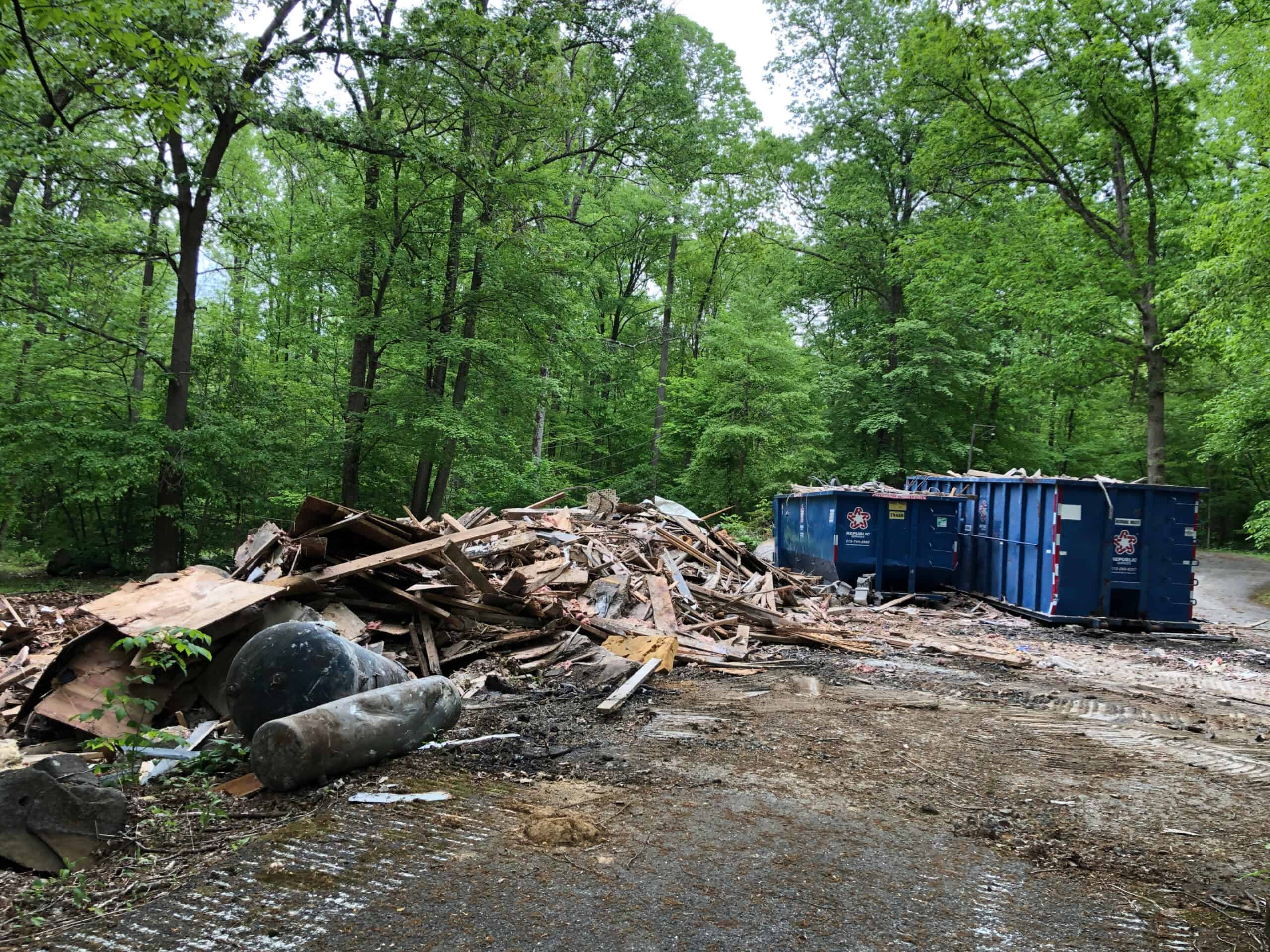 Debris from a building demolition in the woods