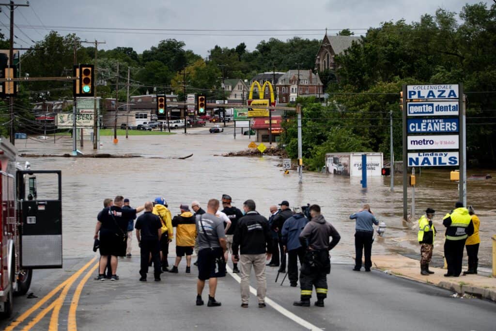 The overflowing Darby Creek inundated roads in Darby Township, Delaware County, following Tropical Storm Isaias in August 2020.