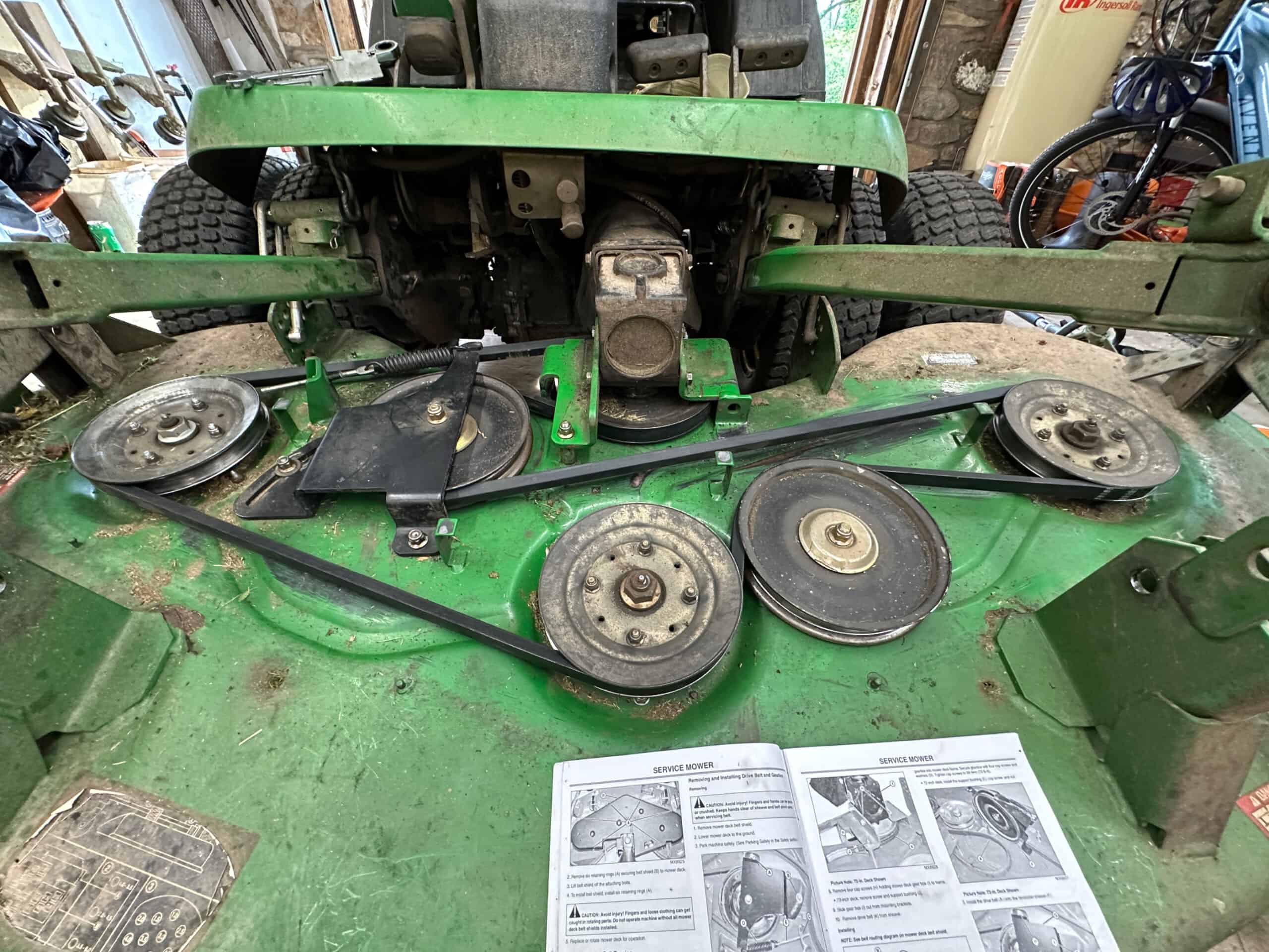 Photo of the blade belt on a lawnmower.