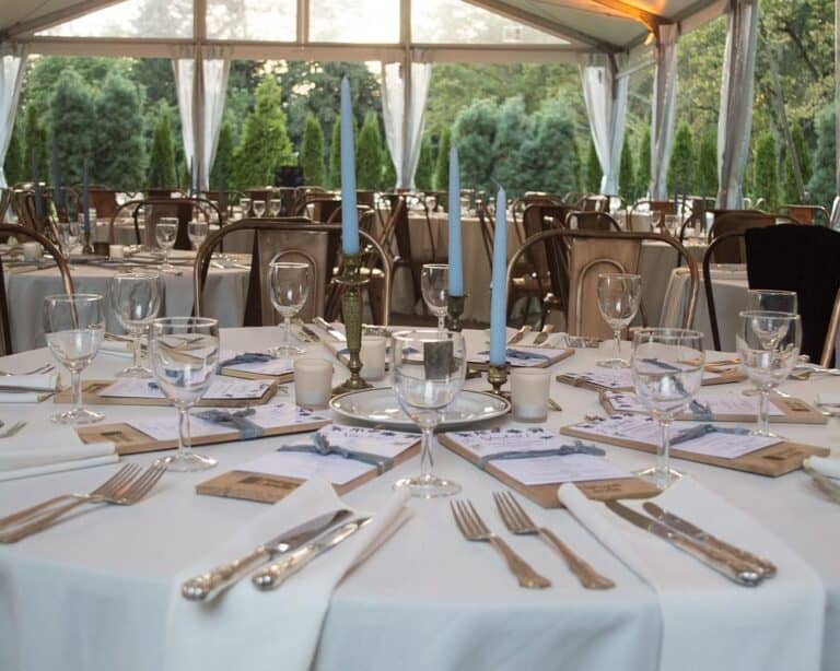 A round table set for dinner at Stoneleigh